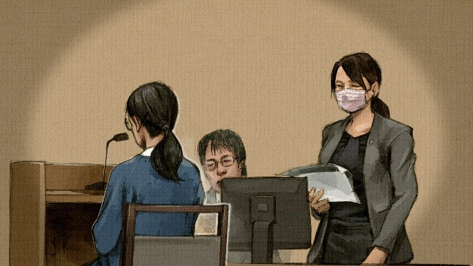 写真=弁護側に質問に答える浩子被告