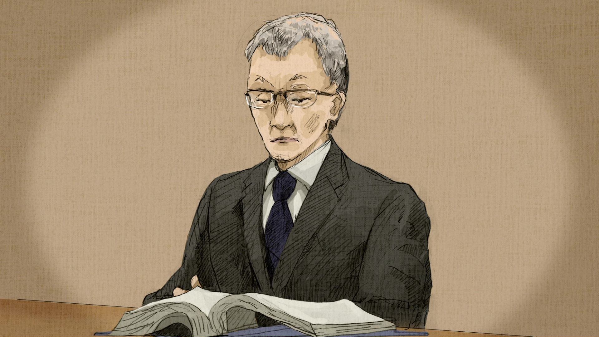 黒のスーツ姿で入廷