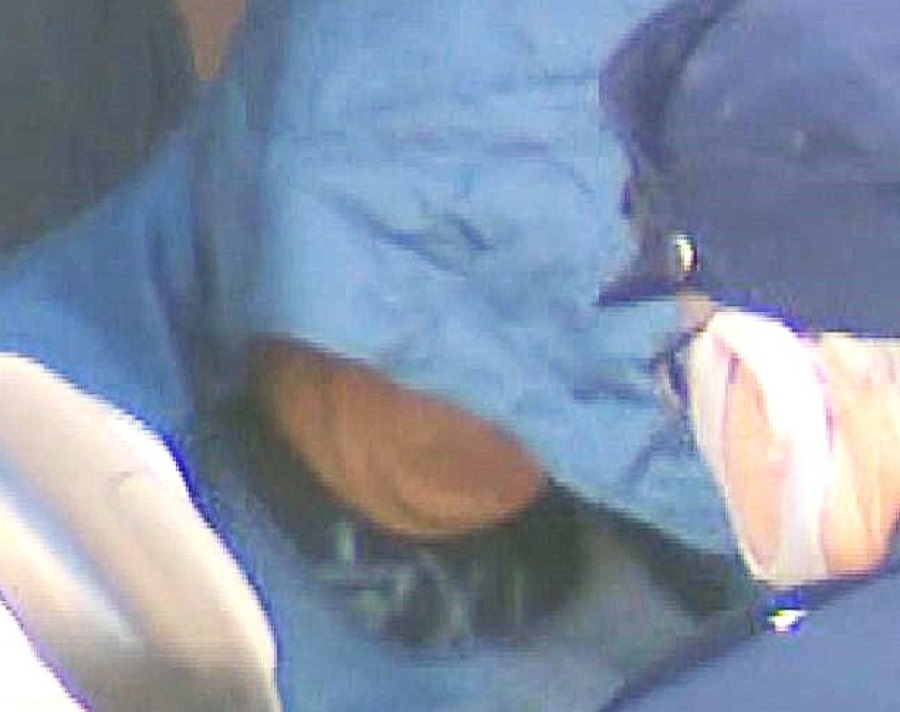 送検される塚本洋一容疑者