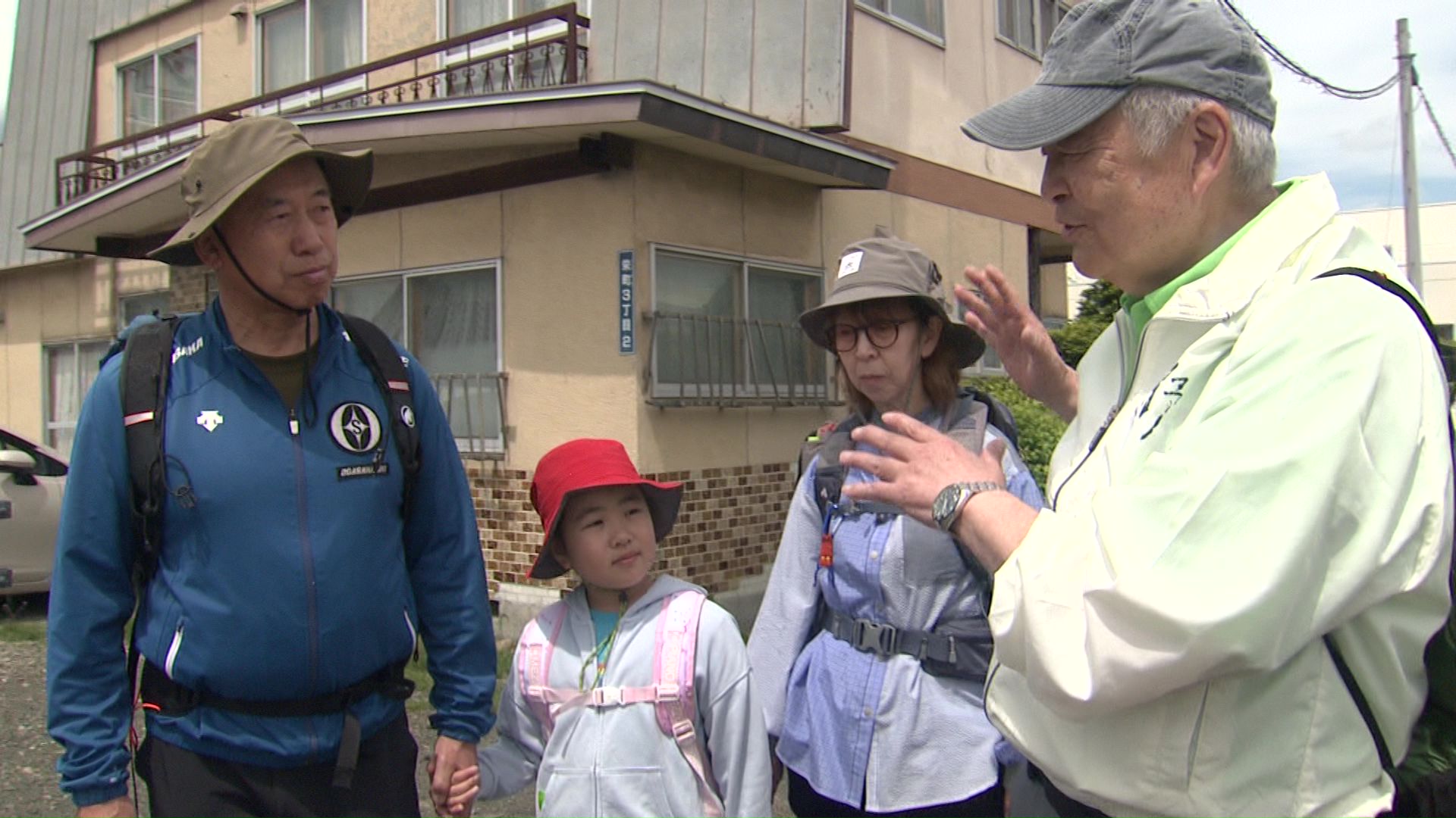 噴火の歴史を語り継ぐ活動に取り組む佐川さん