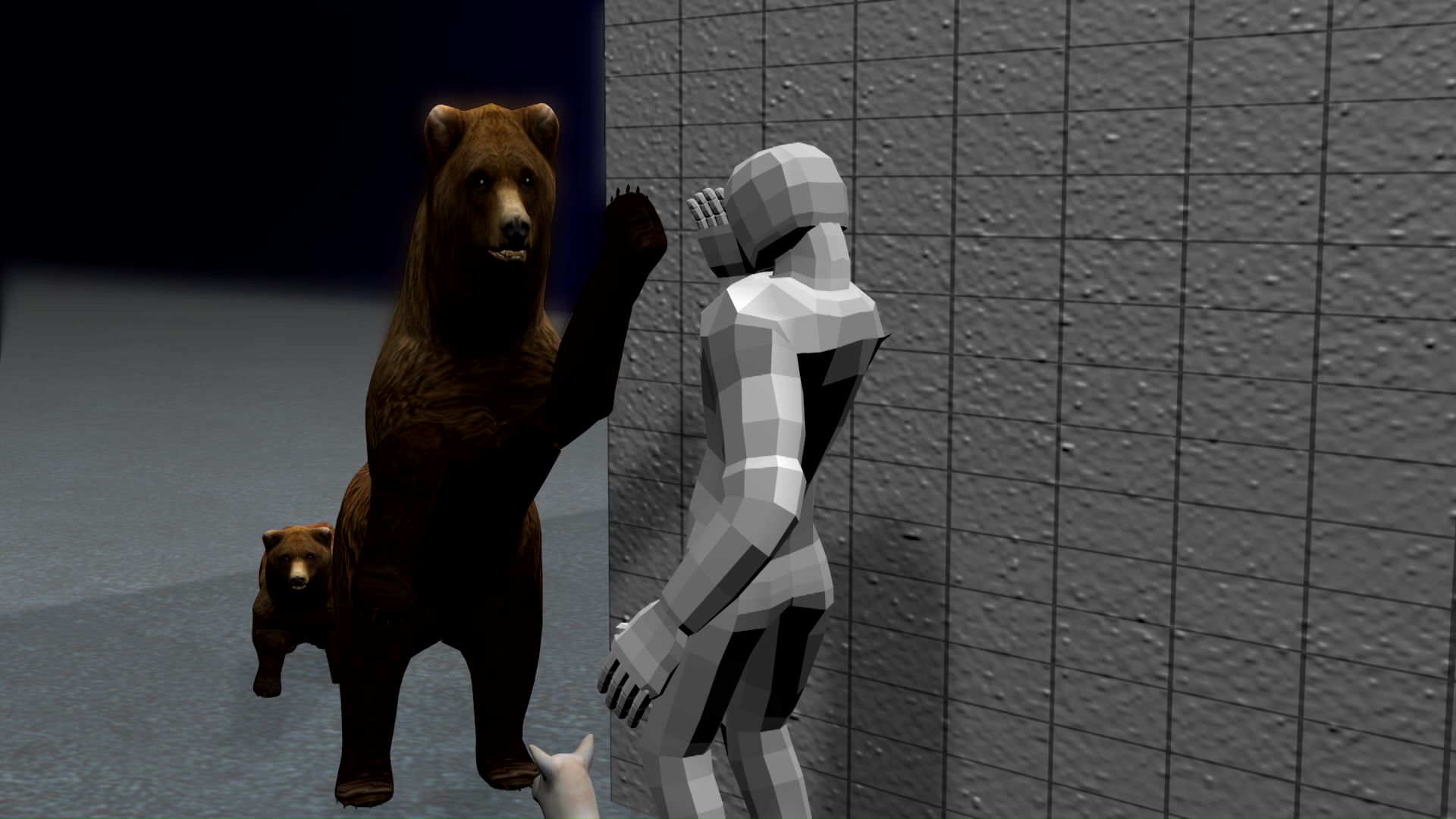 1頭が左前足で男性を攻撃