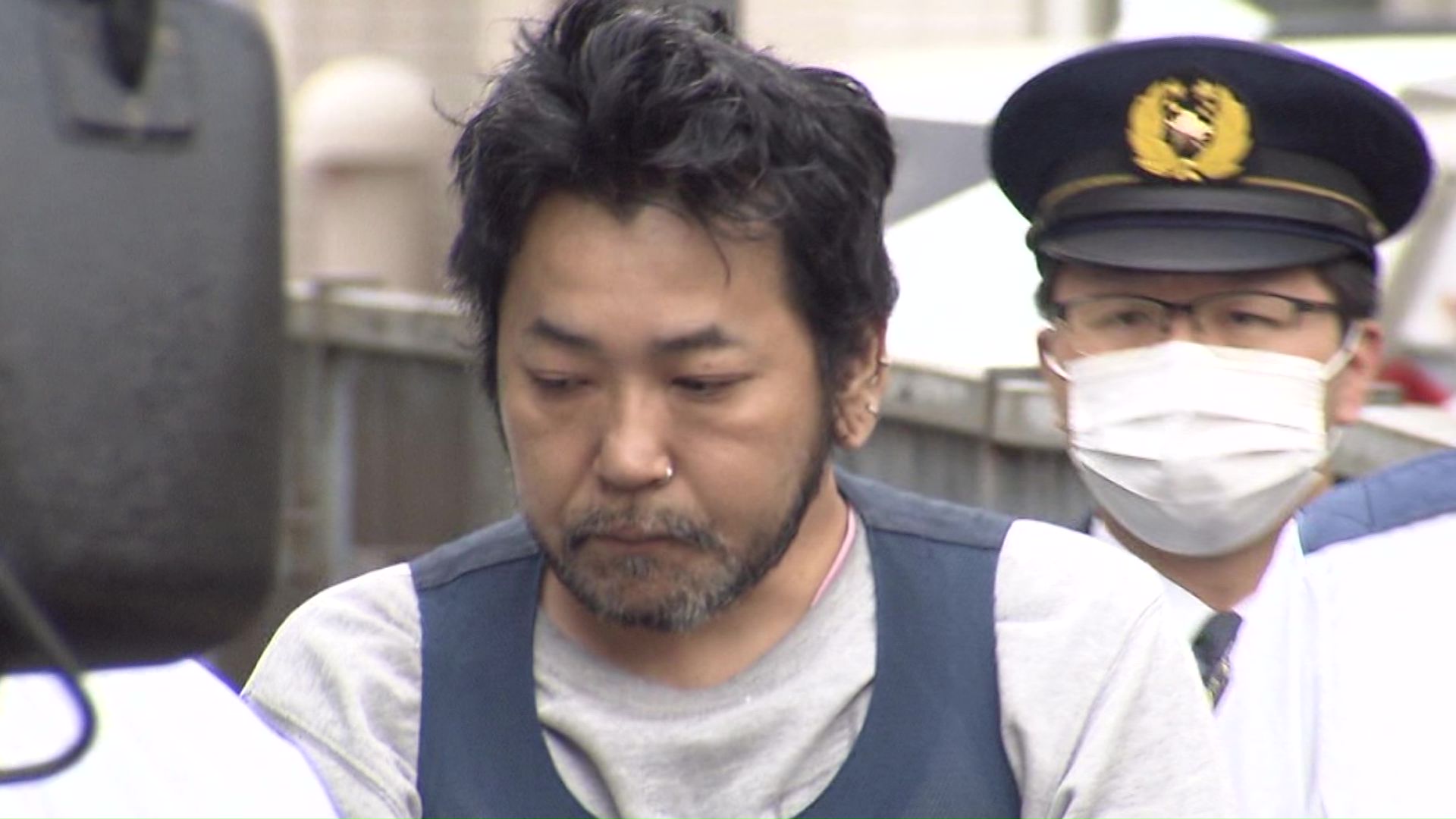 送検される中村純一容疑者