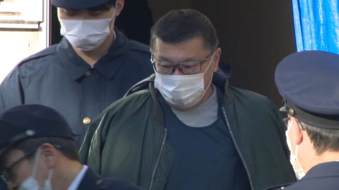 送検される会長の川合容疑者