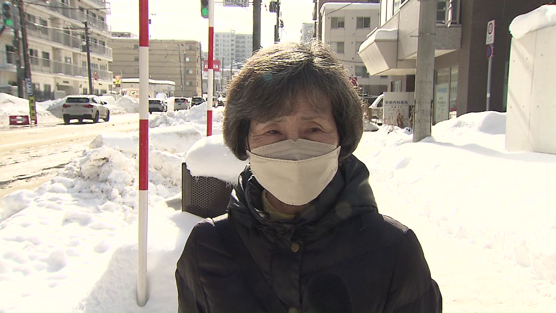 暖かいと話す札幌市民