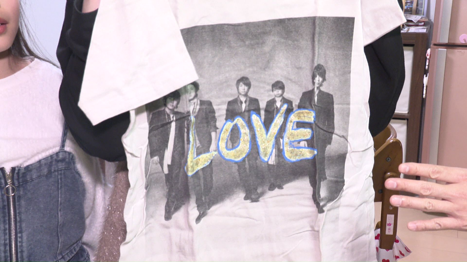 長男の優和さんを抱っこしながら参加したライブで着ていたTシャツ